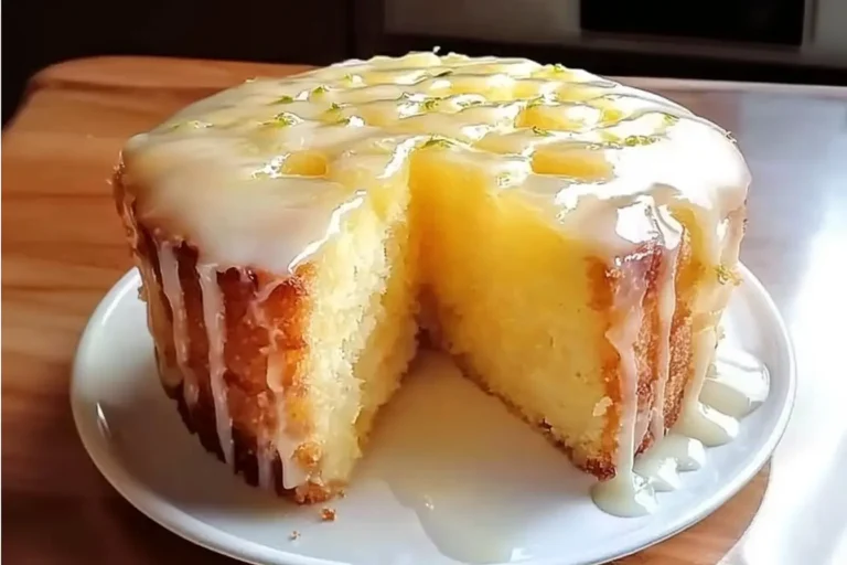 Moist pineapple juice cake with lime glaze dripping down the sides